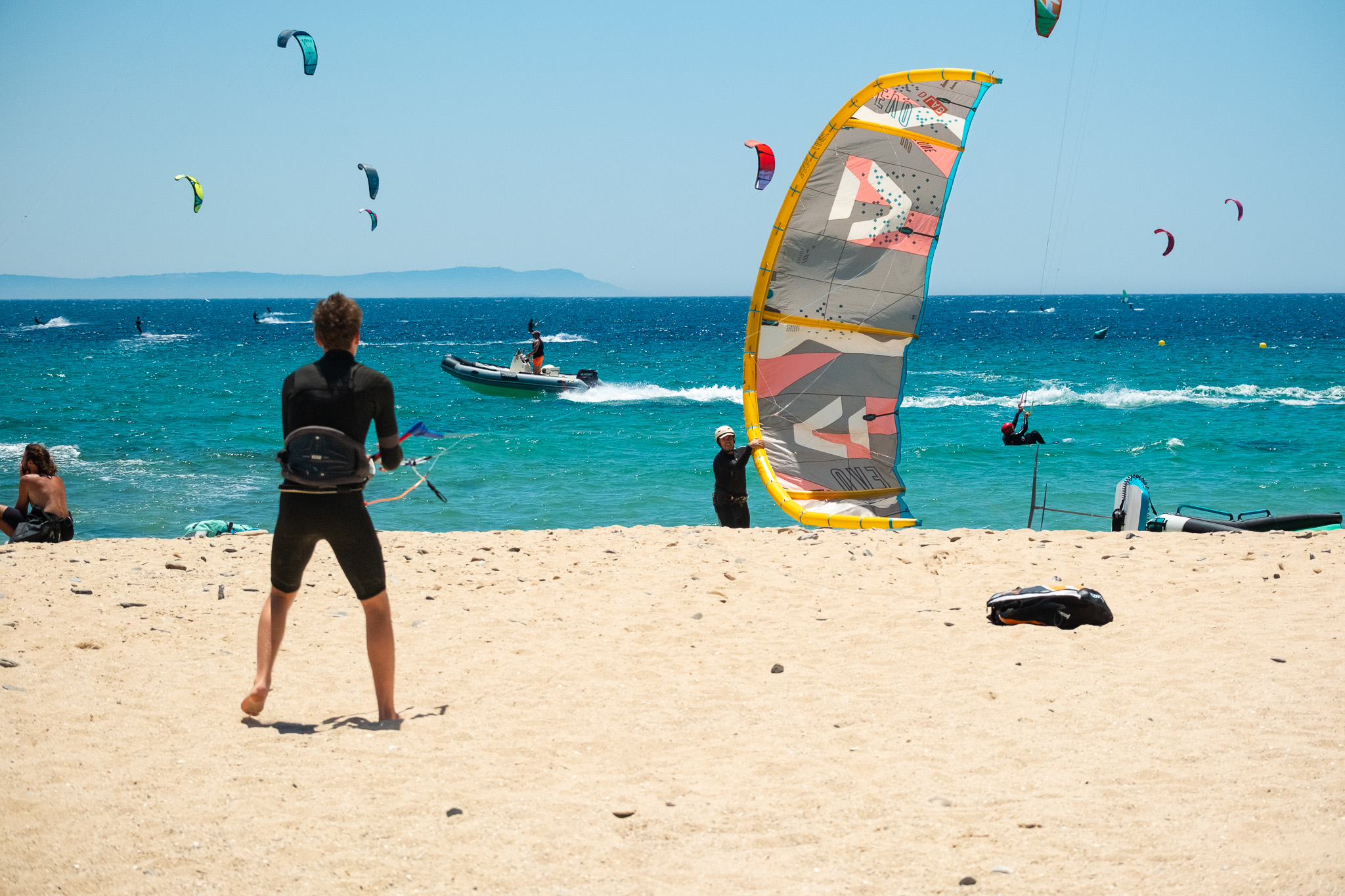 Kitesurfers launching and riding at Valdevaqueros Beach in Tarifa