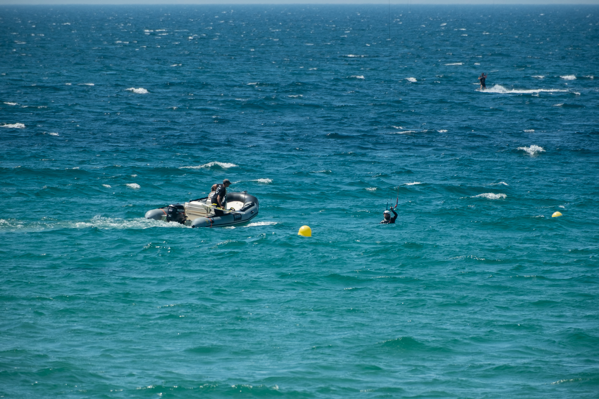 Rescue boat supporting a kitesurf student during a lesson at Valdevaqueros Beach in Tarifa