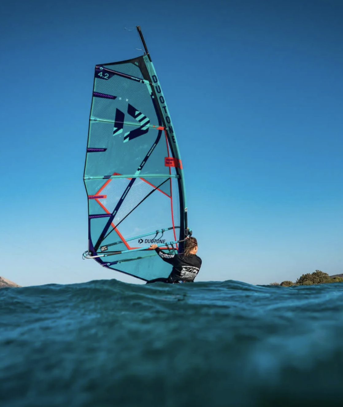 A windsurfer having a session in Tarifa, at Liam Pro Center with duotone gear
